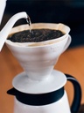 https://cdn.shopify.com/s/files/1/0792/2666/7327/files/hario_v60-02-ceramic-dripper_white_pourover_6_1800x1800_fcde07c4-55ba-40a4-aefa-098cfd5815d7.jpg?v=1690579837