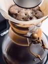 https://cdn.shopify.com/s/files/1/0792/2666/7327/files/chemex_filter-circles_in-use_machine_1800x1800_77dc954e-dcf3-495a-98ec-a3d1a0cd4c4a.jpg?v=1690579909